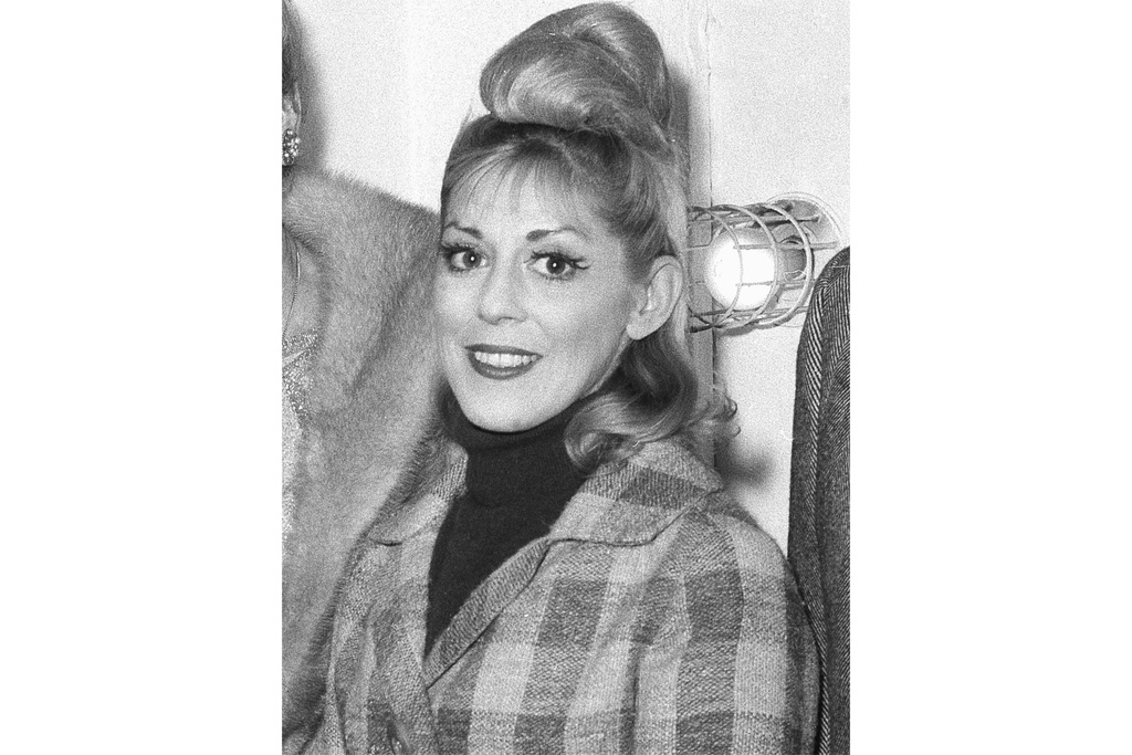 FILE - Sondra Lee, a cast member for the Broadway show "Hello Dolly1" appears backstage at the St. James Theater in New York on Oct. 14, 1964. (AP Photo/Harvey Lippman, File)