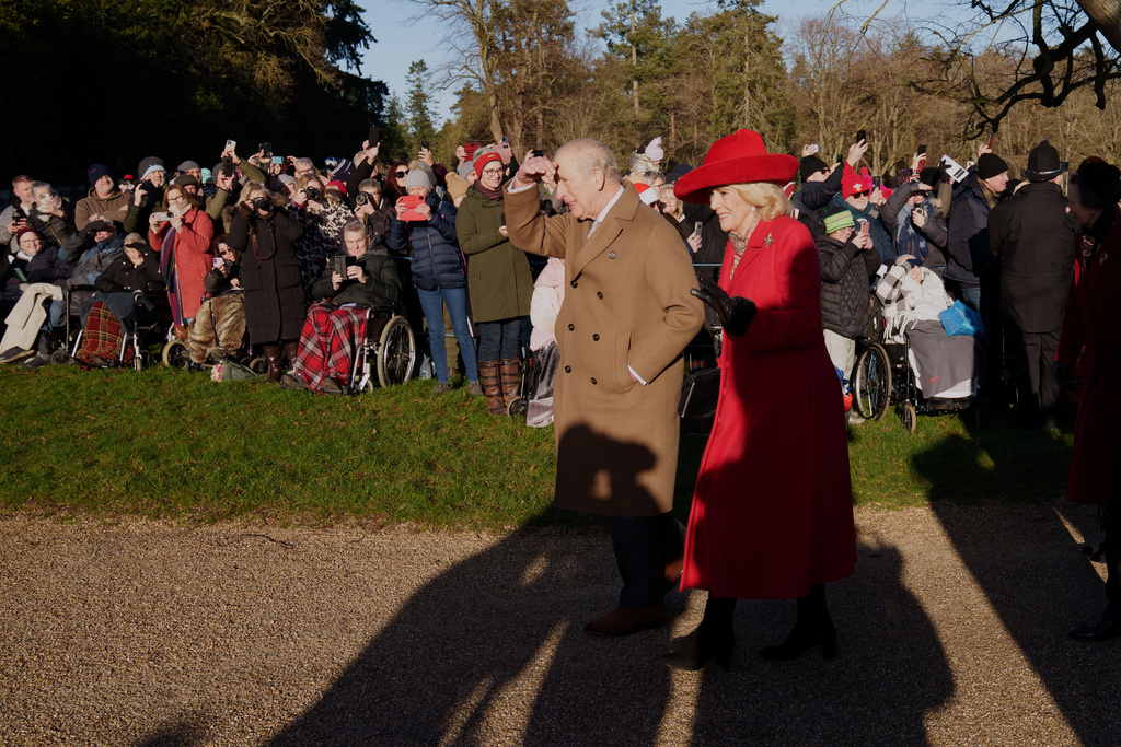 Britain's King Charles III and Queen Camilla arrive to attend the Christmas Day service at St Mary Magdalene Church in Sandringham, Norfolk, England, Thursday, Dec. 25, 2025.(AP Photo/Jon Super)