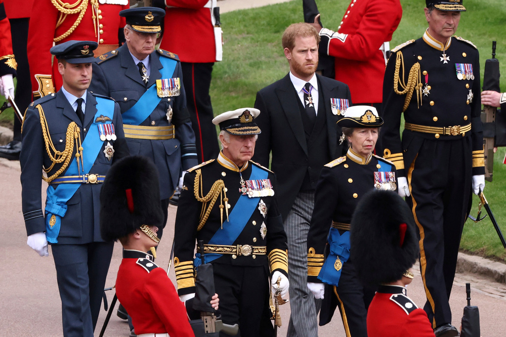 FILE - Britain's King Charles III, Princess Anne, Prince William and Prince Harry follow Queen Elizabeth II's coffin at St. George's Chapel at Windsor Castle, Windsor, England, on Sept. 19, 2022. (Henry Nicholls/Pool via AP, File)