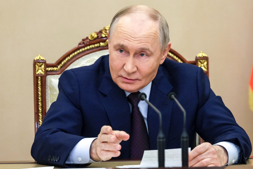 Russian President Vladimir Putin chairs a meeting with members of the Security Council in Moscow, Russia, Wednesday, Nov. 5, 2025. (Gavriil Grigorov, Sputnik, Kremlin Pool Photo via AP)