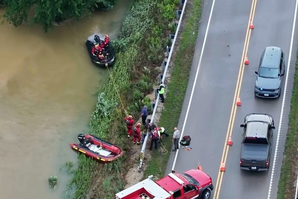 This image made from video provided by KTVI shows emergency workers handling flash flooding in Lesterville, Mo., Friday, July 10, 2026. (KTVI via AP)