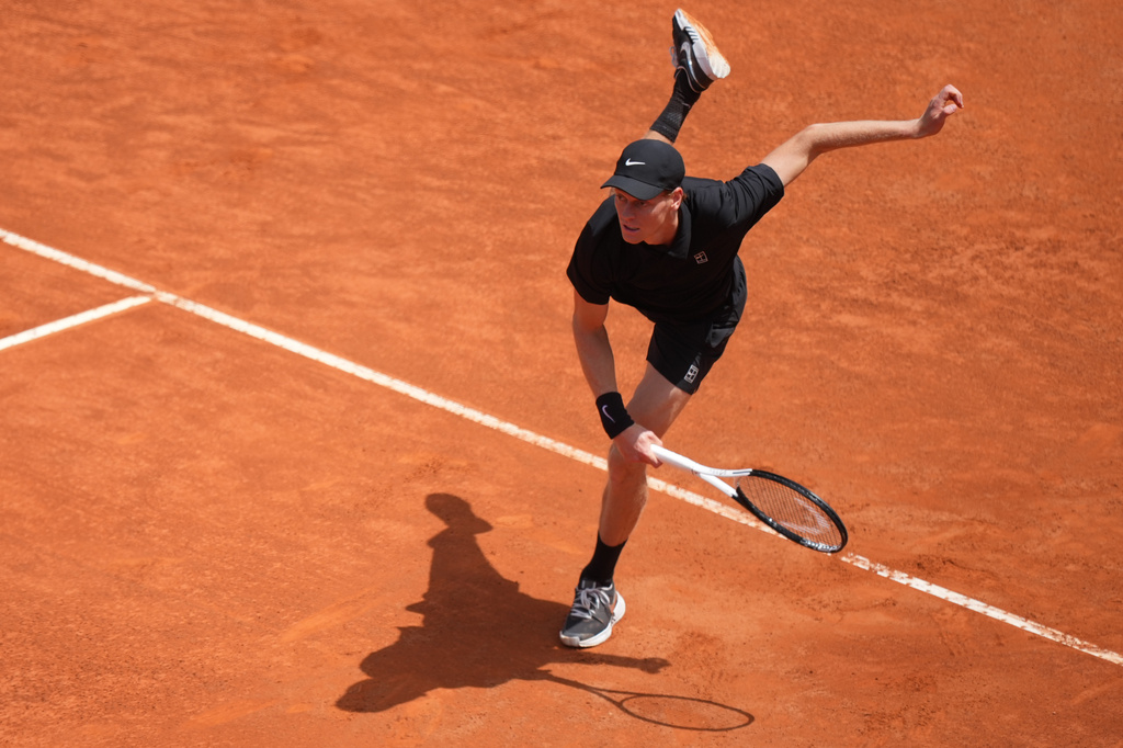 Italy's Jannik Sinner serves a ball to Andrey Rublev, during their match at the Italian Open tennis tournament in Rome, Thursday, May 14, 2026. (AP Photo/Andrew Medichini)
