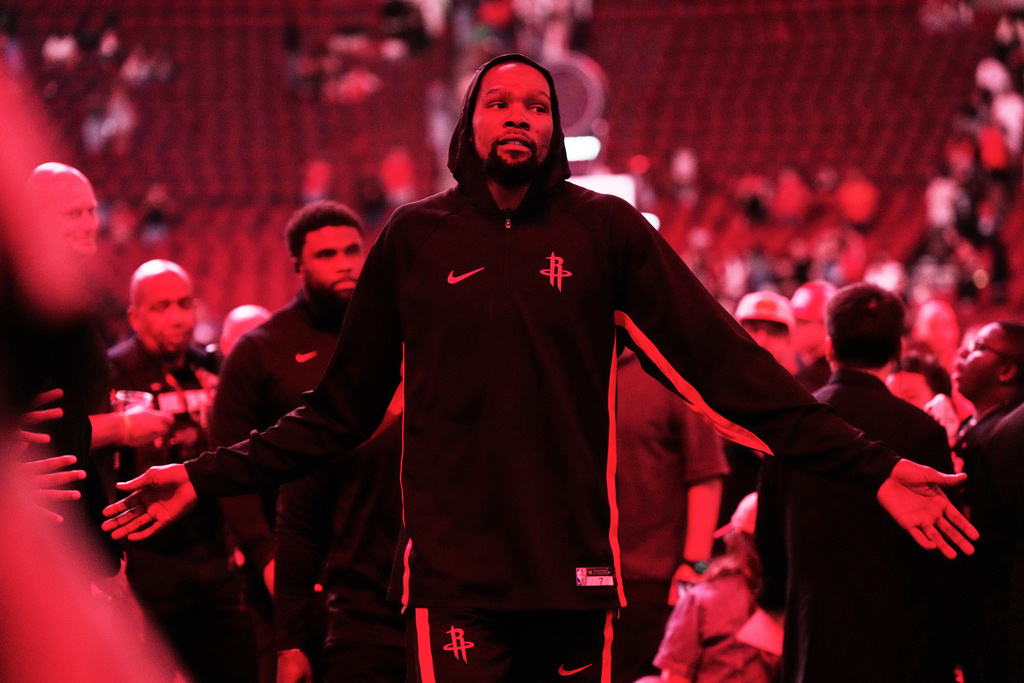Houston Rockets forward Kevin Durant (7) leaves the court after an NBA basketball preseason game against the Utah Jazz in Houston, Wednesday, Oct. 8, 2025. (AP Photo/Ashley Landis)