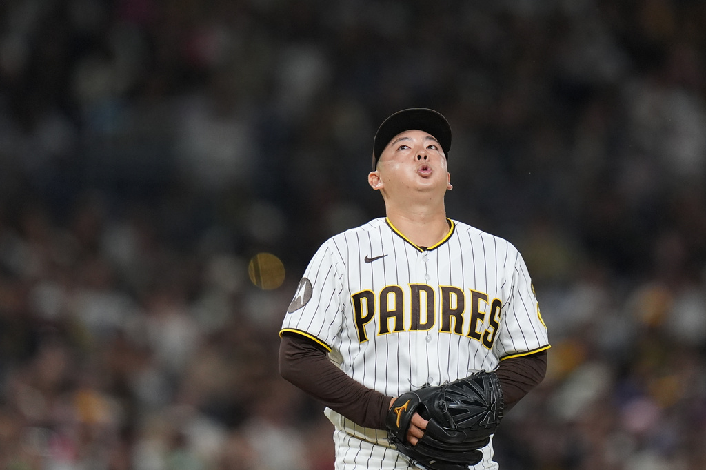 San Diego Padres pitcher Yuki Matsui takes a breath as he works against a Miami Marlins batter during the seventh inning of a baseball game Saturday, Sept. 19, 2026, in San Diego. (AP Photo/Gregory Bull)