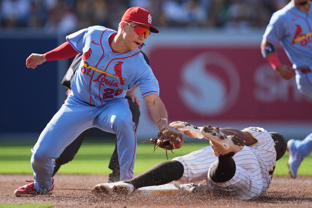 San Diego Padres' Xander Bogaerts, right, safely steals second base as St. Louis Cardinals second baseman JJ Wetherholt is late with the tag during the second inning of a baseball game Saturday, May 9, 2026, in San Diego. (AP Photo/Gregory Bull)