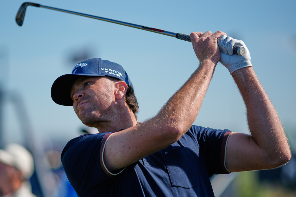 Marcus Plunkett of the United States plays a shot on the 11th tee on the arduring a practice round for the British Open Golf championships at Royal Birkdale golf club, in Southport, England, Tuesday, July 14, 2026. (AP Photo/David Goldman)