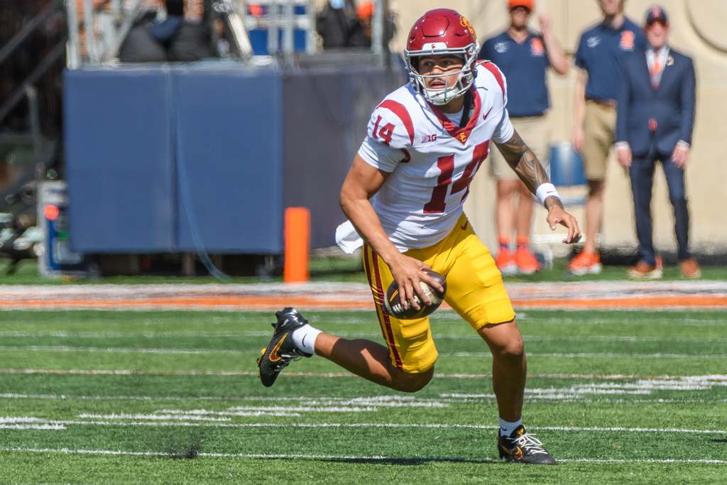 Southern California quarterback Jayden Maiava (14) looks for a receiver during the first half of an NCAA college football game against Illinois, Saturday, Sept. 27, 2025, in Champaign, Ill. (AP Photo/Craig Pessman)