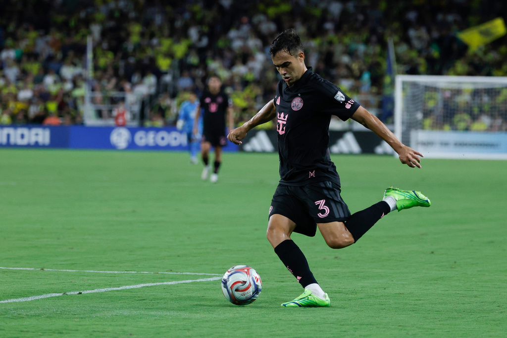 Inter Miami CF defense Sergio Reguilón (3) takes a shot on goal during the first half of an MLS soccer match against the Nashville SC Saturday, Aug. 15, 2026, in Nashville, Tenn. (AP Photo/Butch Dill)