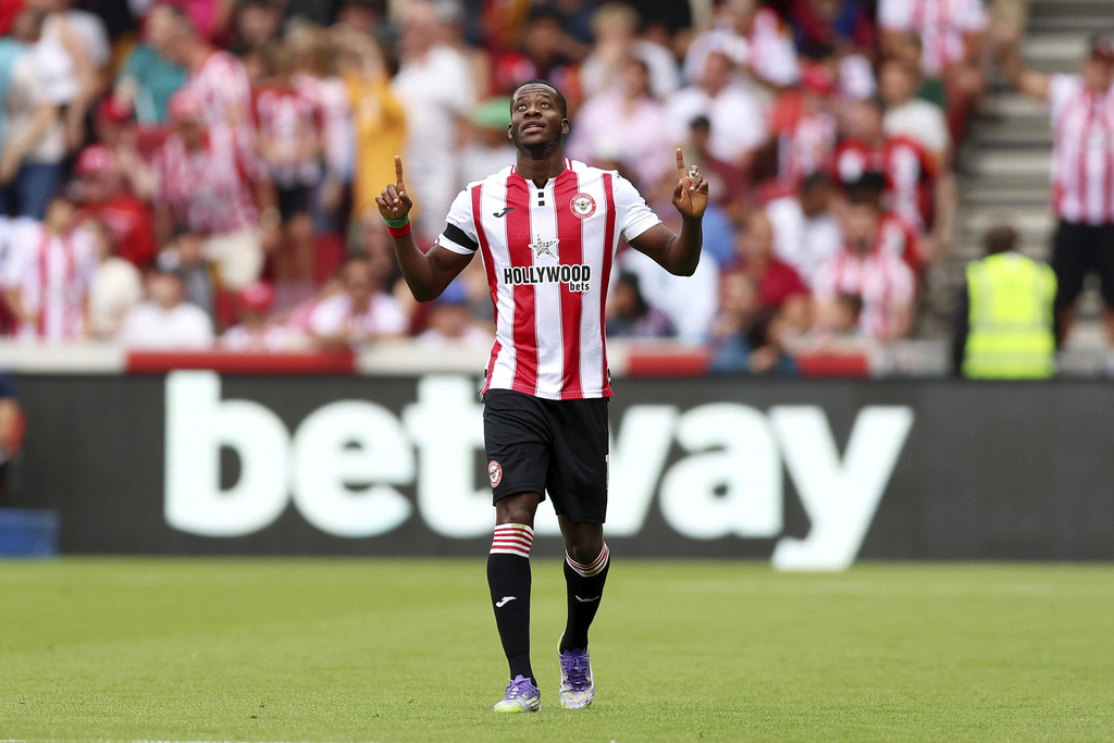 Brentford's Dango Ouattara celebrates scoring their side's first goal of the game during the English Premier League soccer match between Brentford and Aston Villa at the Gtech Community Stadium in London, Saturday, Aug. 23, 2025. (Nigel French/PA via AP)