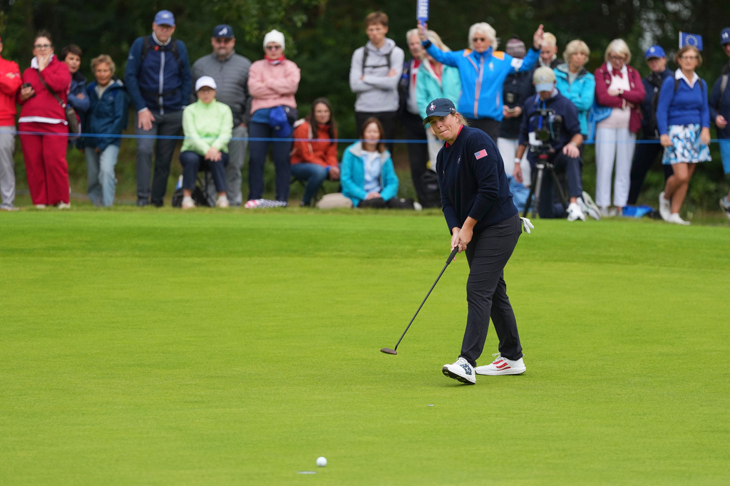 Lauren Coughlin of the United States putts on the 10th green during the Solheim Cup at the Bernardus Golf course in Den Bosch, Netherlands, Friday, Sept. 11, 2026. (AP Photo/Alastair Grant)