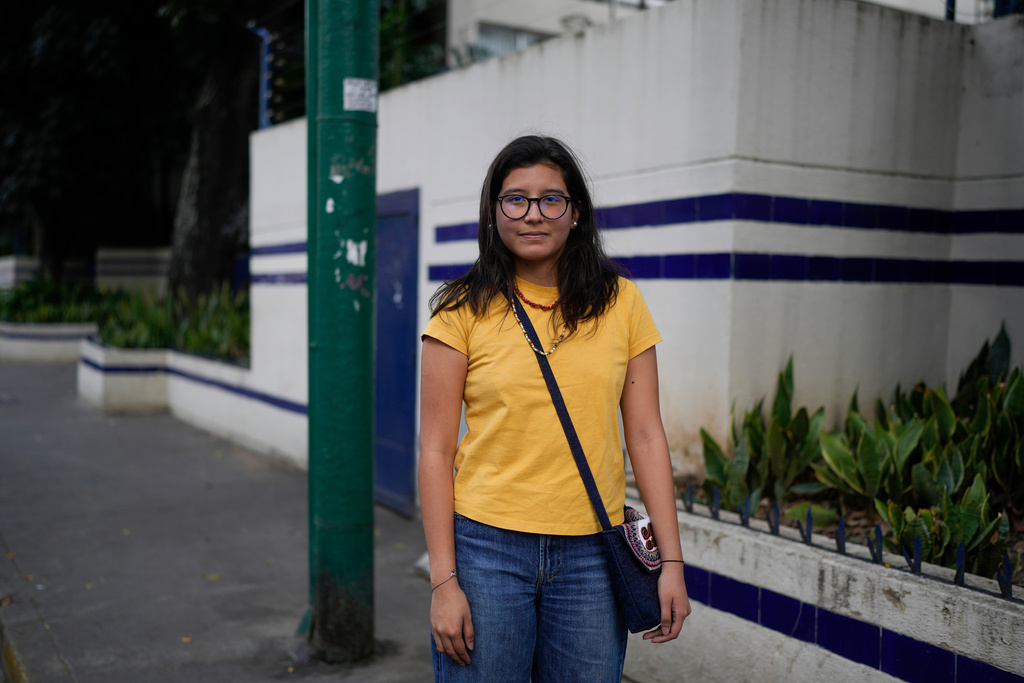 Mariana Camargo poses for a photo in the Altamira neighborhood of Caracas, Venezuela, Tuesday, Jan. 6, 2026. (AP Photo/Matias Delacroix)