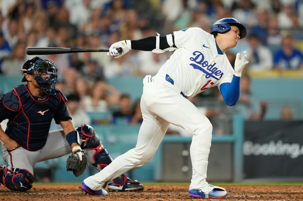 Los Angeles Dodgers two-way player Shohei Ohtani strikes out while batting during the seventh inning of Game 2 of a National League Division Series baseball game against the Atlanta Braves Sunday, Oct. 4, 2026, in Los Angeles. (AP Photo/Mark J. Terrill)