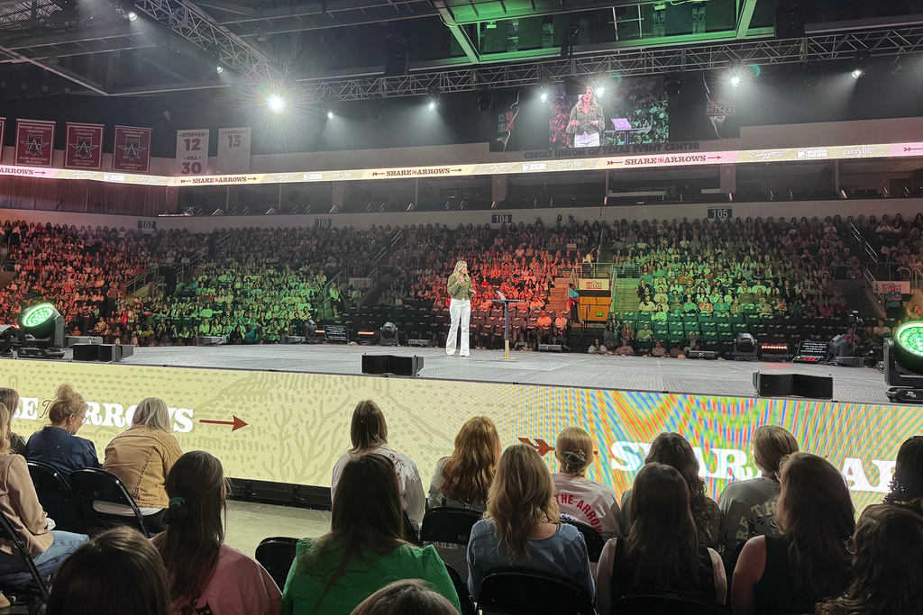 Allie Beth Stuckey speaks during the "Share the Arrows" women's conference, Saturday, Oct. 11, 2025, at the Credit Union of Texas Event Center in Allen, Texas. (Kathryn Post/RNS via AP)