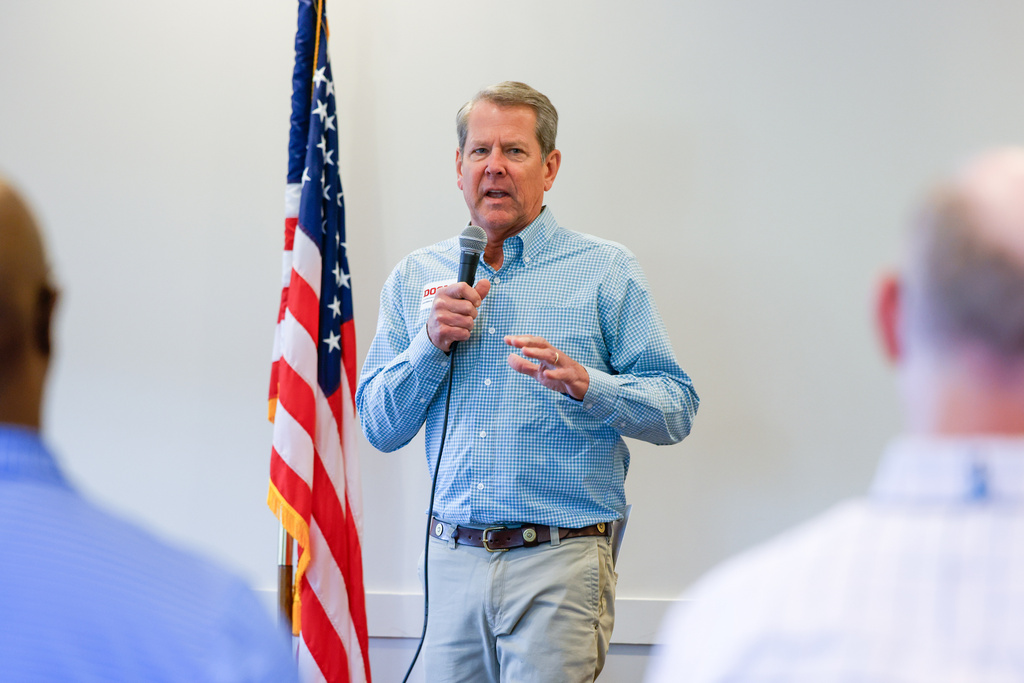 Gov. Brian Kemp speaks during a campaign stop for Republican U.S. Senate candidate Derek Dooley at Farmview Market in Madison, Ga., on May 8, 2026. (Arvin Temkar/Atlanta Journal-Constitution via AP)
