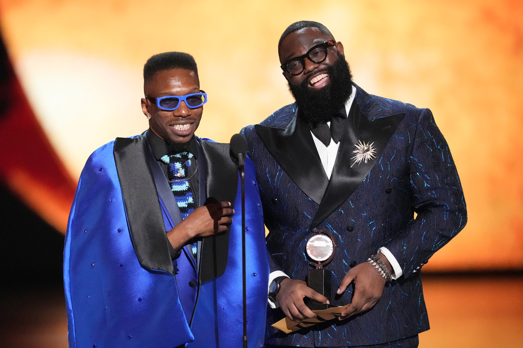 Omari Wiles, left, and Arturo Lyons accept the award for best choreography for "Cats: The Jellicle Ball" during the 79th Tony Awards on Sunday, June 7, 2026, at Radio City Music Hall in New York. (Photo by Charles Sykes/Invision/AP)