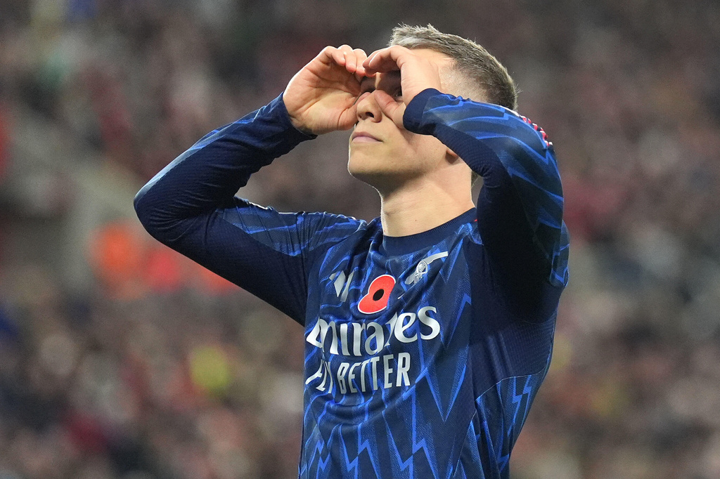 Arsenal's Leandro Trossard celebrates scoring their side's second goal of the game during the English Premier League soccer match between Arsenal and Sunderland, in Sunderland, England, Saturday Nov. 8, 2025. (Owen Humphreys/PA via AP)