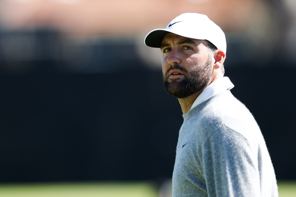 Scottie Scheffler walks on the 18th hole during the third round of the Genesis Invitational golf tournament at Riviera Country Club, Saturday, Feb. 21, 2026, in the Pacific Palisades area of Los Angeles. (AP Photo/Caroline Brehman )