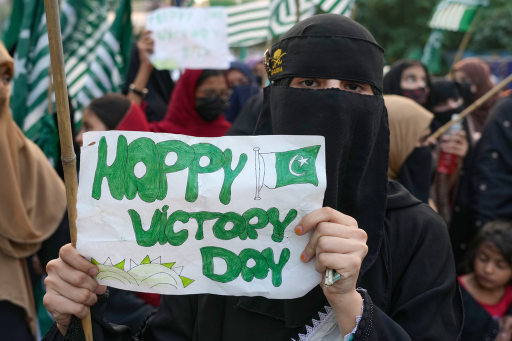 Supporters of Muslim women league Pakistan, hold a placard during rally to mark the anniversary of last year's four-day conflict with neighboring India, Thursday, May 7, 2026, in Lahore, Pakistan. (AP Photo/K.M. Chaudary)