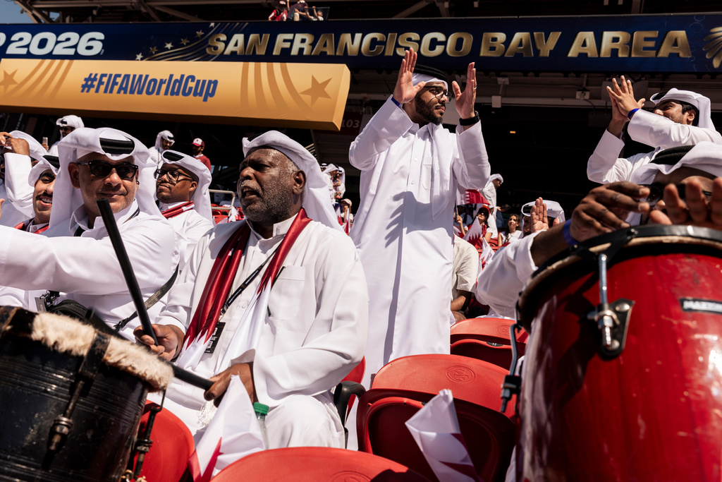 Qatari fans chant before the FIFA World Cup 2026 Group B match between Qatar and Switzerland at San Francisco Bay Area Stadium in Santa Clara, Calif., Saturday, June 13, 2026. (Stephen Lam/San Francisco Chronicle via AP)
