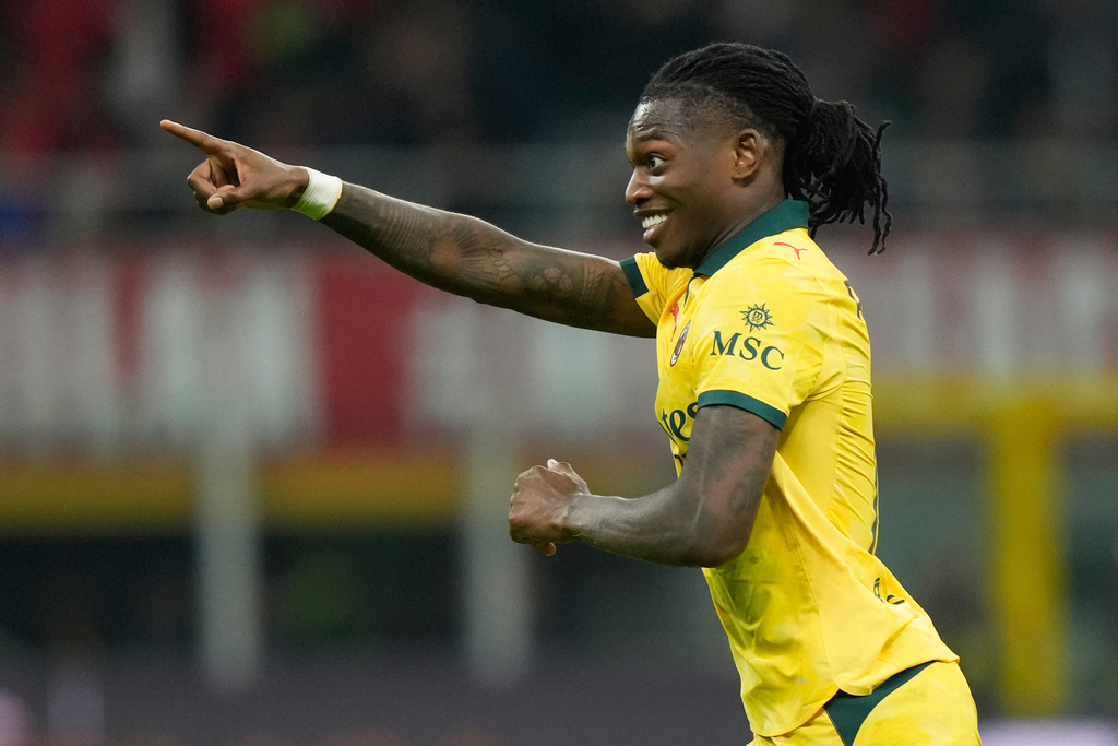 AC Milan's Rafael Leao celebrates scoring his side's first goal during a Serie A soccer match between AC Milan and Fiorentina in Milan, Italy, Sunday, Oct. 19, 2025. (AP Photo/Luca Bruno)