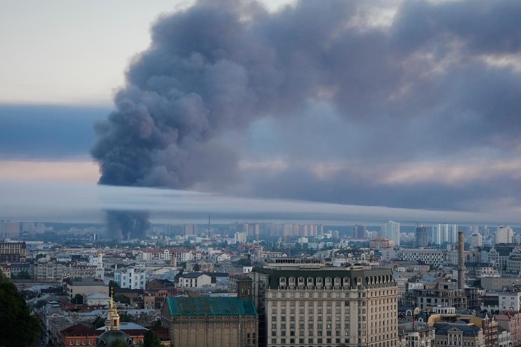 Smoke rises over the city center after a Russian attack on Kyiv, Ukraine, Thursday, July 2, 2026. (AP Photo/Efrem Lukatsky)