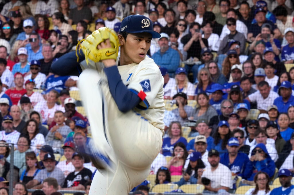 Los Angeles Dodgers starting pitcher Roki Sasaki throws to the plate during the first inning of a baseball game against the Philadelphia Phillies, Saturday, May 30, 2026, in Los Angeles. (AP Photo/Mark J. Terrill)