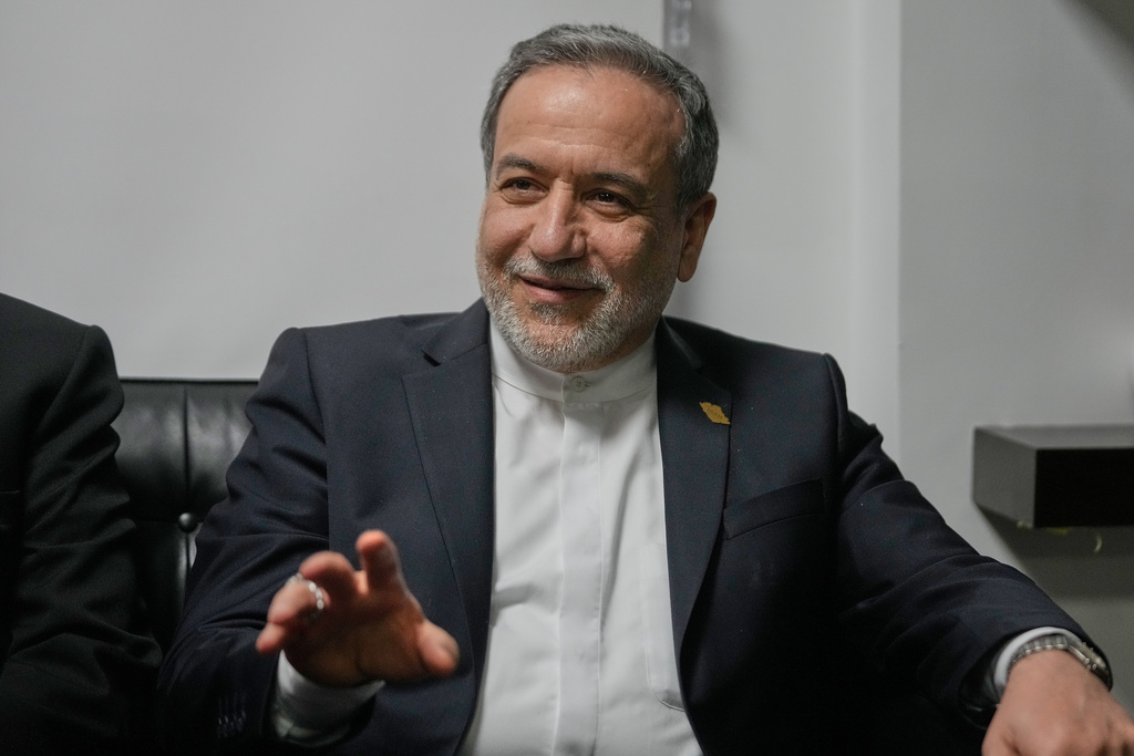 Iranian Foreign Minister Abbas Araghchi, right, gestures as he meets with Amer Bisat, the Lebanese minister of Economy and Trade, in Beirut, Lebanon, Thursday, Jan. 8, 2026. (AP Photo/Hussein Malla)