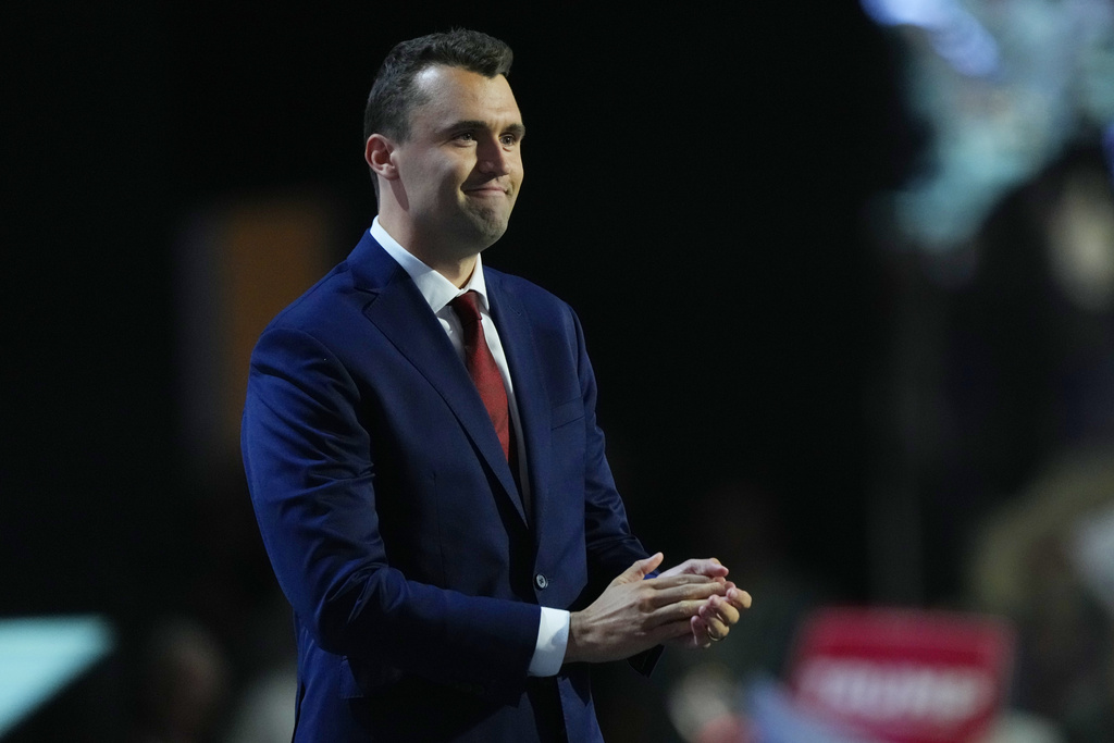 FILE- Charlie Kirk, co-founder of Turning Point USA, stands during microphone check before the start of the first day of the Republican National Convention, July 15, 2024, in Milwaukee. (AP Photo/Matt Rourke, File)