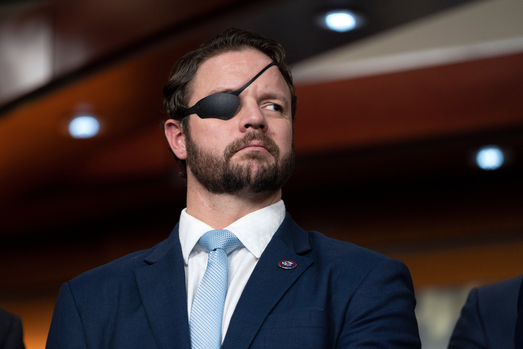 FILE - Rep. Dan Crenshaw, R-Texas, attends a news conference with Republicans, Jan. 4, 2023, on Capitol Hill in Washington. (AP Photo/Jacquelyn Martin, File)
