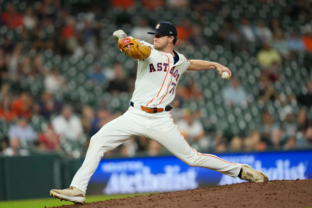 Houston Astros pitcher Josh Hader throws against the Los Angeles Angels during the ninth inning of a baseball game Wednesday, Aug. 19, 2026, in Houston. (AP Photo/David J. Phillip)