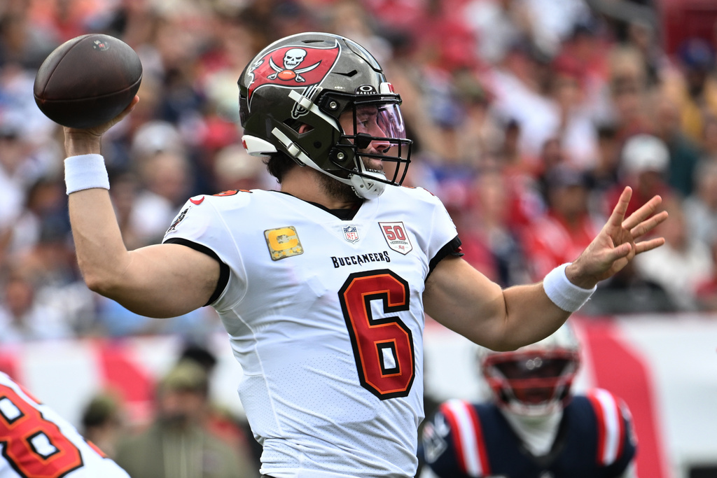 Tampa Bay Buccaneers quarterback Baker Mayfield (6) throws against the New England Patriots during the first half of an NFL football game Sunday, Nov. 9, 2025, in Tampa, Fla. (AP Photo/Jason Behnken)