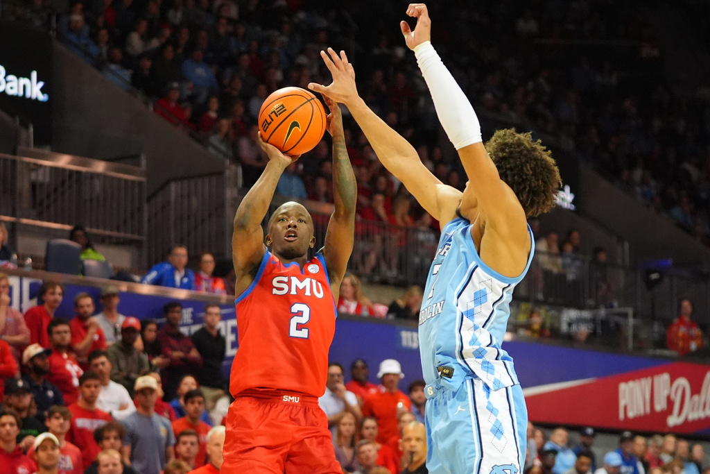 SMU guard Boopie Miller (2) shoots against North Carolina guard Seth Trimble (7) during the second half of an NCAA college basketball game Saturday, Jan. 3, 2026, in Dallas. (AP Photo/LM Otero)