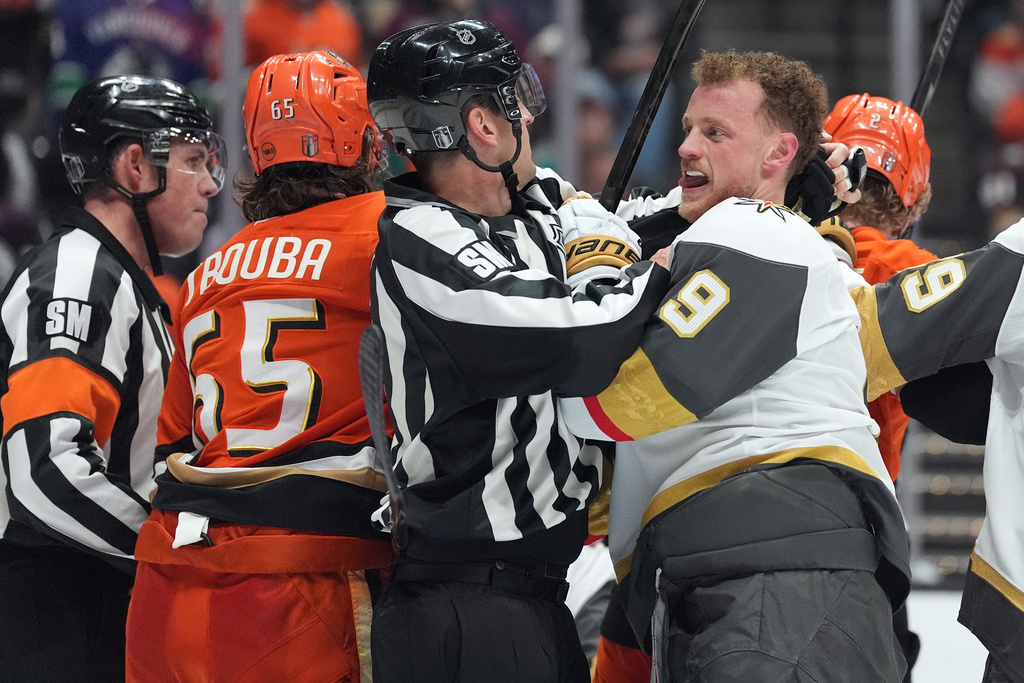 Vegas Golden Knights' Jack Eichel (9) is separated from Anaheim Ducks' Jacob Trouba (65) during the second period of an NHL hockey game Sunday, May 10, 2026, in Anaheim, Calif. (AP Photo/Scott Strazzante)