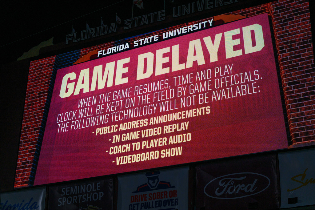 Florida State's scoreboard shows a delay message due to a blackout before an NCAA college football game against SMU, Monday, Sept. 7, 2026, in Tallahassee, Fla. (AP Photo/Noah Lantor)