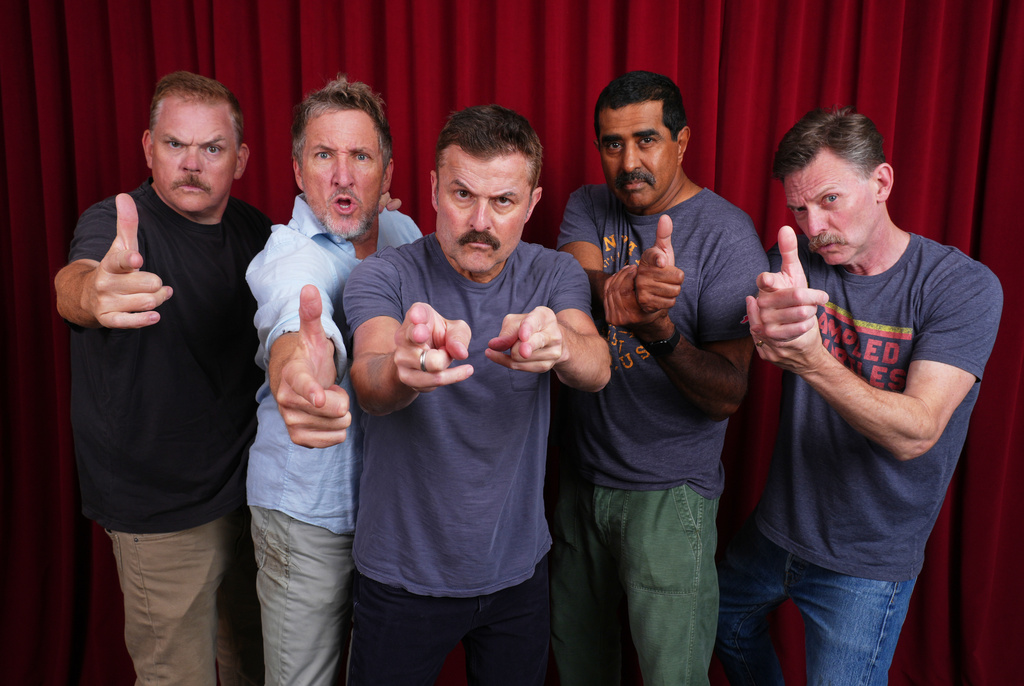 Cast members, from left, Kevin Heffernan, Paul Soter, Steve Lemme, Jay Chandrasekhar and Erik Stolhanske pose for a portrait to promote the film "Super Troopers 3" on Monday, July 27, 2026, in Burbank, Calif. (AP Photo/Chris Pizzello) CORRECTION: Corrects spelling of Stolhanske's first name from Eric to Erik.