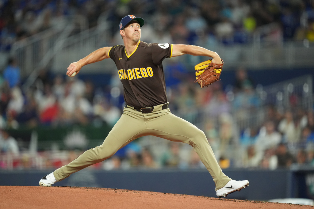 San Diego Padres starting pitcher Walker Buehler delivers during the first inning of a baseball game against the Miami Marlins, Sunday, July 26, 2026, in Miami. (AP Photo/Rebecca Blackwell)