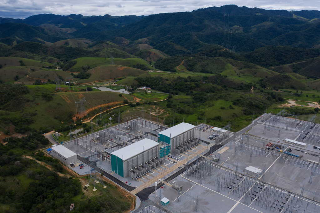 FILE - The Xingu Rio Energy Transmitter (XRTE Rio) power transmission substation operates in Paracambi, Brazil, transmitting the electrical power that comes from the Belo Monte Dam on Dec. 4, 2019. (AP Photo/Leo Correa, File)