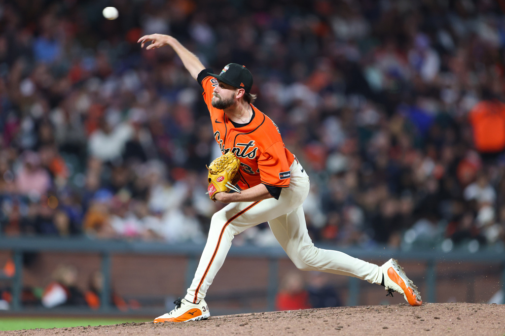 San Francisco Giants pitcher JT Brubaker throws to a Chicago Cubs batter during the sixth inning of a baseball game Friday, June 12, 2026, in San Francisco, Calif. (AP Photo/Scott Marshall)
