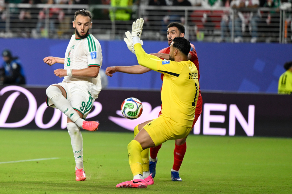 Algeria's Amine Gouiri, left, scores his side's second goal against Jordan during the World Cup Group J soccer match in Santa Clara, Calif., near San Francisco, Monday, June 22, 2026. (AP Photo/Eakin Howard)