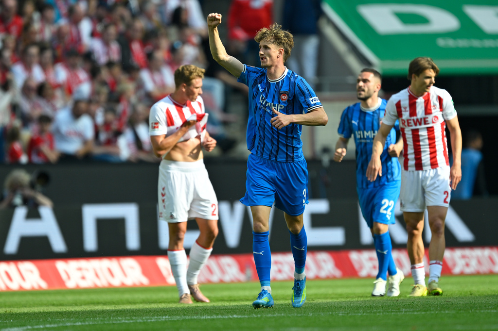 Heidenheim's gJan Schöppner celebrates after scoring the opening goal during the Bundesliga soccer match between 1. FC Köln and 1. FC Heidenheim, in Cologne, Germany, Sunday, May 10, 2026. (Ulrich Hufnagel/dpa via AP)