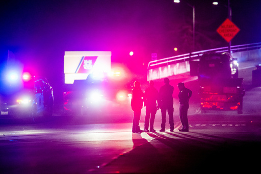 Law enforcement officers investigate the entrance to Coast Guard Base Alameda after shots were fired at a U-Haul truck, according to an officer at the scene, Friday, Oct. 24, 2025, in Oakland, Calif. (AP Photo/Noah Berger) Law enforcement officers investigate the entrance to Coast Guard Base Alameda after shots were fired at a U-Haul truck, according to an officer at the scene, Friday, Oct. 24, 2025, in Oakland, Calif. (AP Photo/Noah Berger)