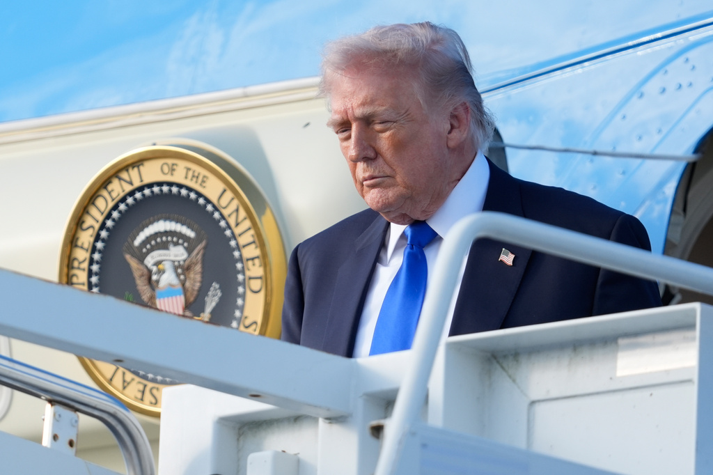 President Donald Trump arrives on Air Force One at Palm Beach International Airport in West Palm Beach Fla., Friday, April 24, 2026. (AP Photo/Manuel Balce Ceneta)