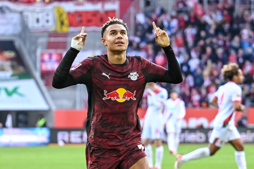 Leipzig's Antonio Nusa celebrates after scoring his side's third goal of the game during the Bundesliga soccer match between FC Augsburg and RB Leipzig, in Augsburg, Germany, Saturday Oct. 25, 2025. (Harry Langer/dpa via AP) Leipzig's Antonio Nusa celebrates after scoring his side's third goal of the game during the Bundesliga soccer match between FC Augsburg and RB Leipzig, in Augsburg, Germany, Saturday Oct. 25, 2025. (Harry Langer/dpa via AP)