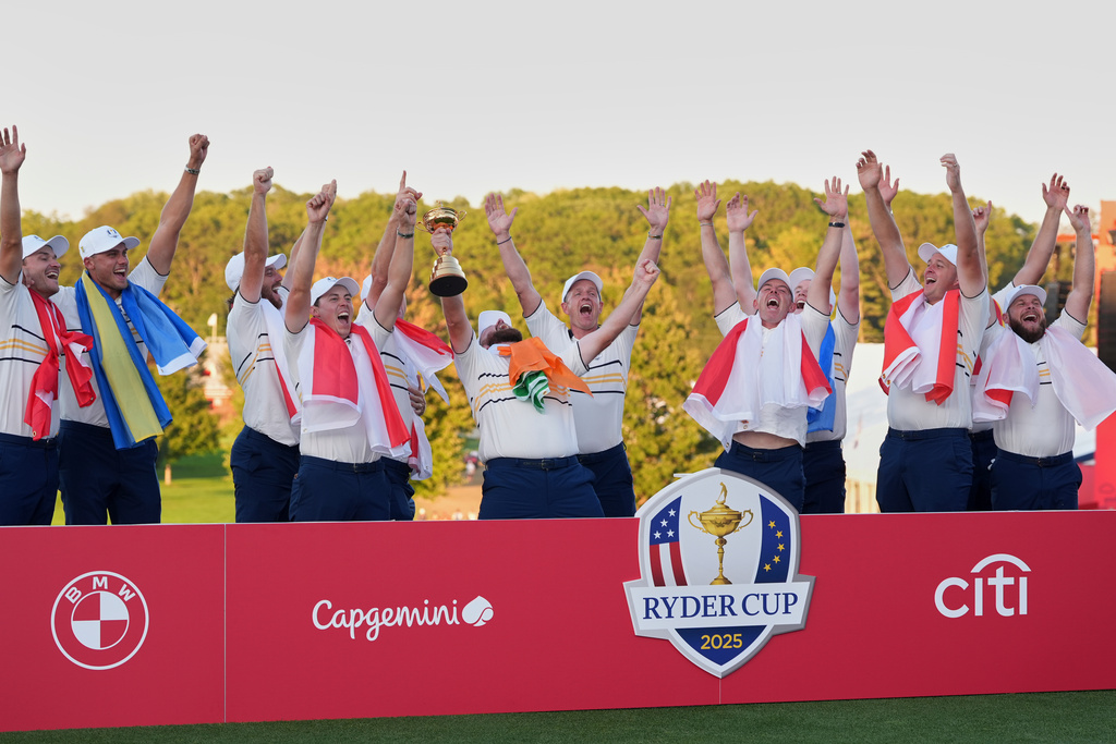 Europe poses with the trophy after winning the Ryder Cup golf tournament against the United States on the Bethpage Black golf course, Sunday, Sept. 28, 2025, in Farmingdale, N.Y. (AP Photo/Lindsey Wasson)