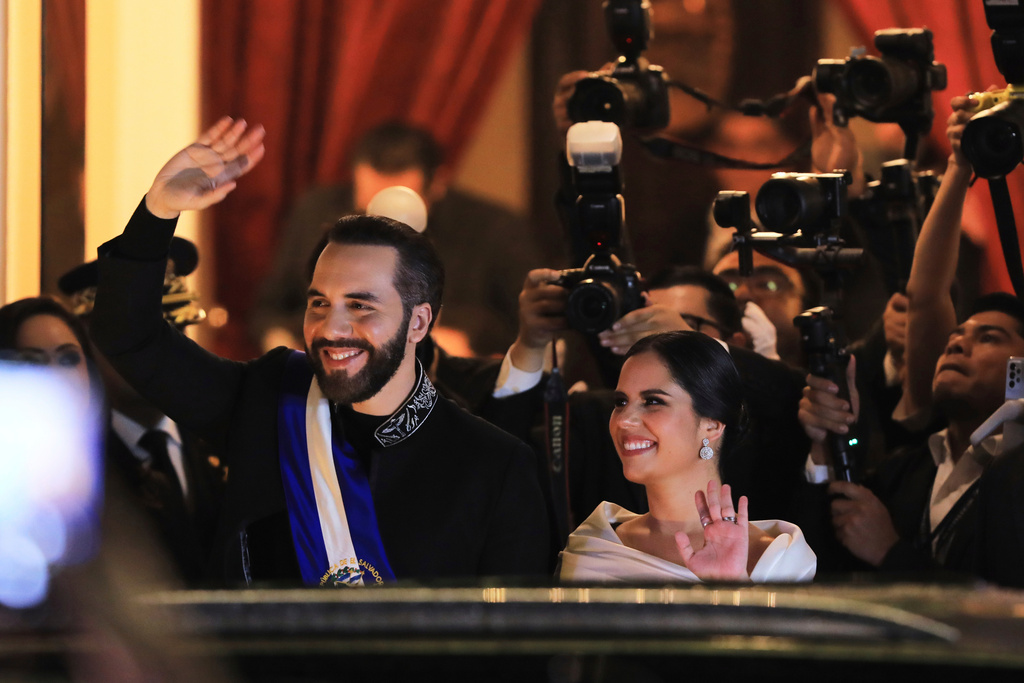 FILE - El Salvador's President Nayib Bukele, left, waves next to first lady Gabriela Bukele after delivering his annual address to Congress at the National Theater in San Salvador, El Salvador, June 1, 2025. (AP Photo/Salvador Melendez, File)