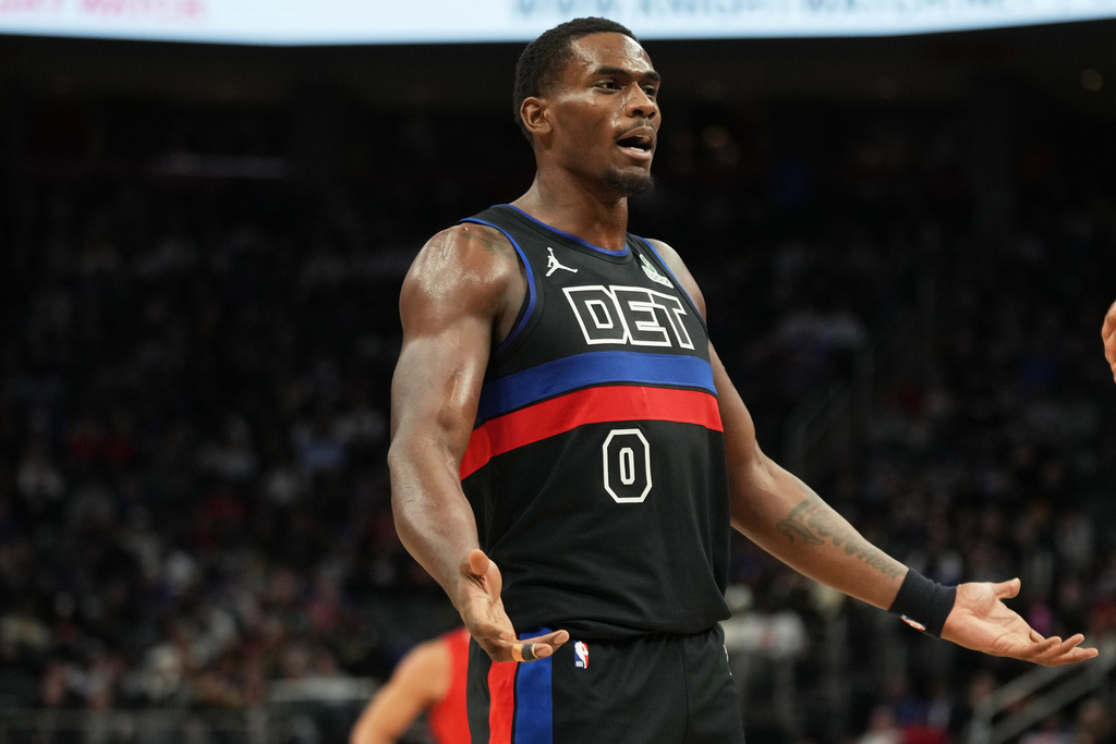 Detroit Pistons center Jalen Duren reacts during the first half of an NBA basketball game against the Portland Trail Blazers, Friday, Dec. 5, 2025, in Detroit. (AP Photo/Ryan Sun)