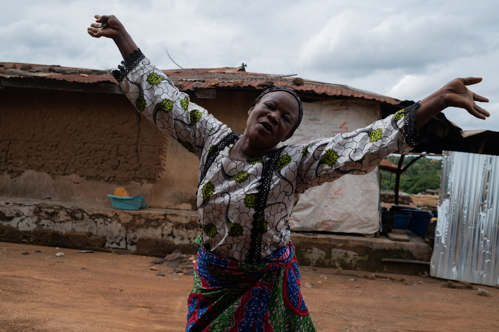 Aduke Balogun mother of Kehinde Kaosarat, a student that was kidnapped with others from a school by al-Qaida-linked fighters reacts after she was released in Esinele, Southwestern, Nigeria, July 17, 2026. (AP Photo/Pelumi Salako)