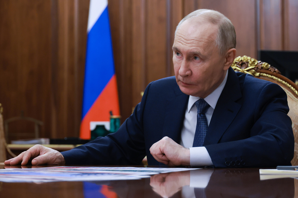 Russian President Vladimir Putin listens to Moscow Mayor Sergei Sobyanin during their meeting at the Kremlin in Moscow, Monday, Feb. 9, 2026. (Vyacheslav Prokofyev/Sputnik, Kremlin Pool Photo via AP)