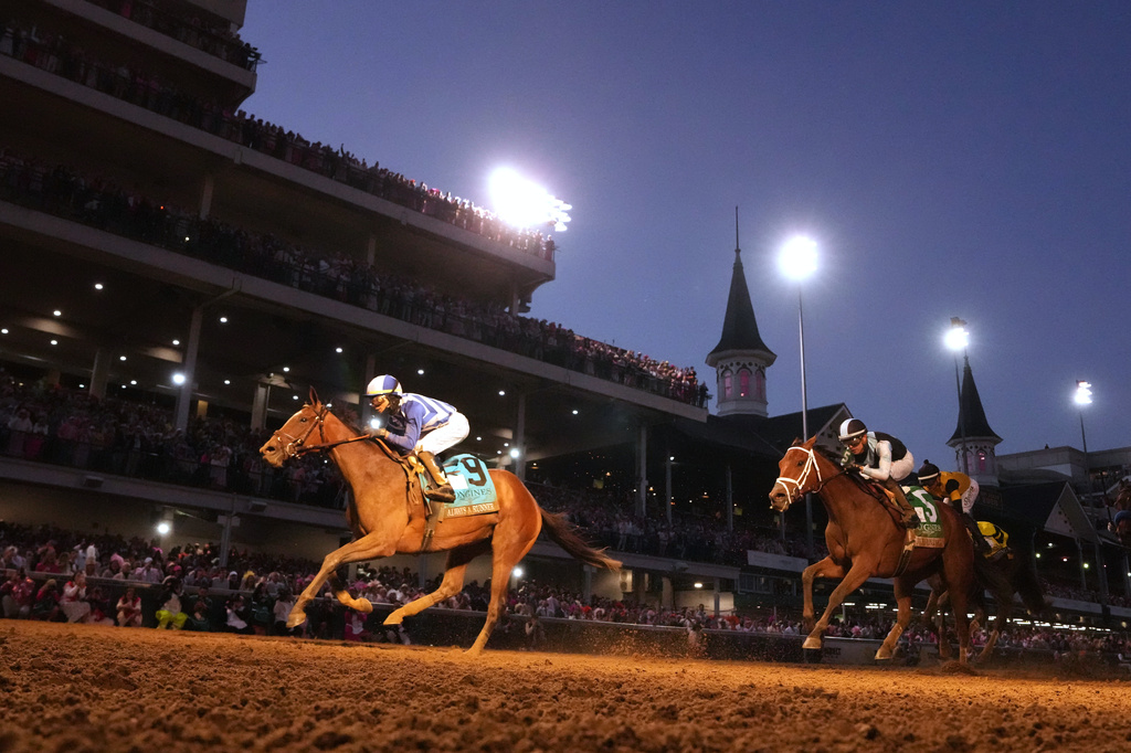 Always a Runner wins the 152nd Kentucky Oaks, the first to run under the lights in prime time