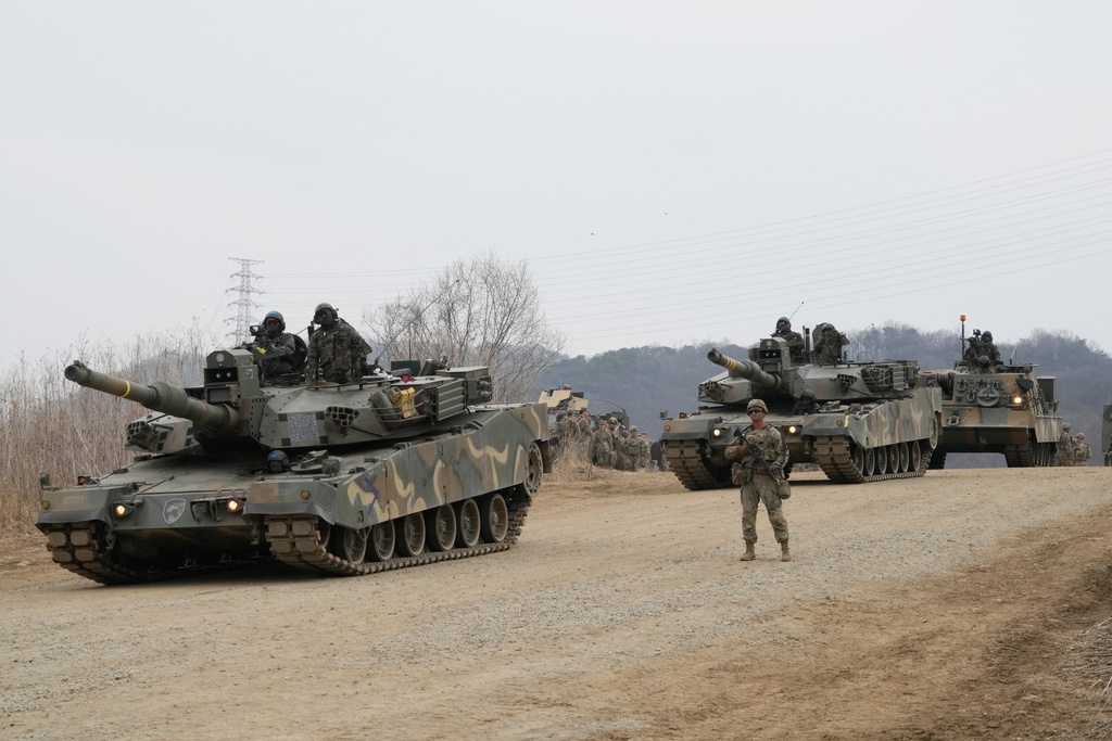 South Korean army's K1A2 tanks move during a joint river-crossing exercise between South Korea and the United States as a part of the Freedom Shield military exercise in Yeoncheon, South Korea, Saturday, March 14, 2026. (AP Photo/Ahn Young-joon)